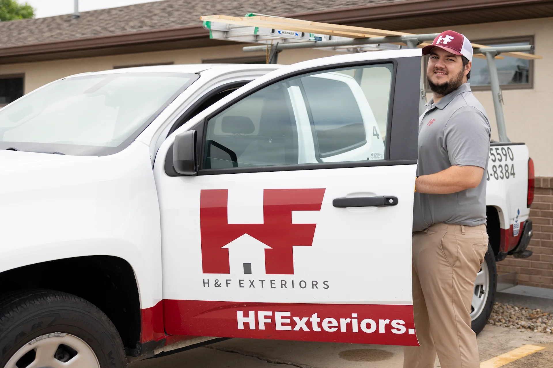 h&f employee entering a truck