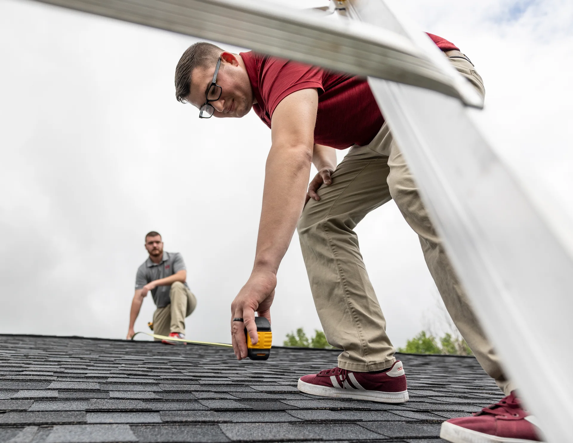 h&f employee working on a roof